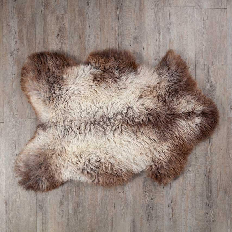 Sumptuously thick fleece in soft creams and rich browns, each rug is completely unique. Approx 90 - 103+ x 55 - 68+ CMS.