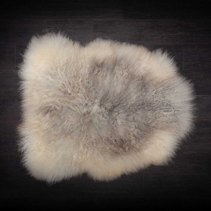 Extra large Swedish sheepskin in tones of light brown, grey and cream. Approx 100 x 80 CMS.