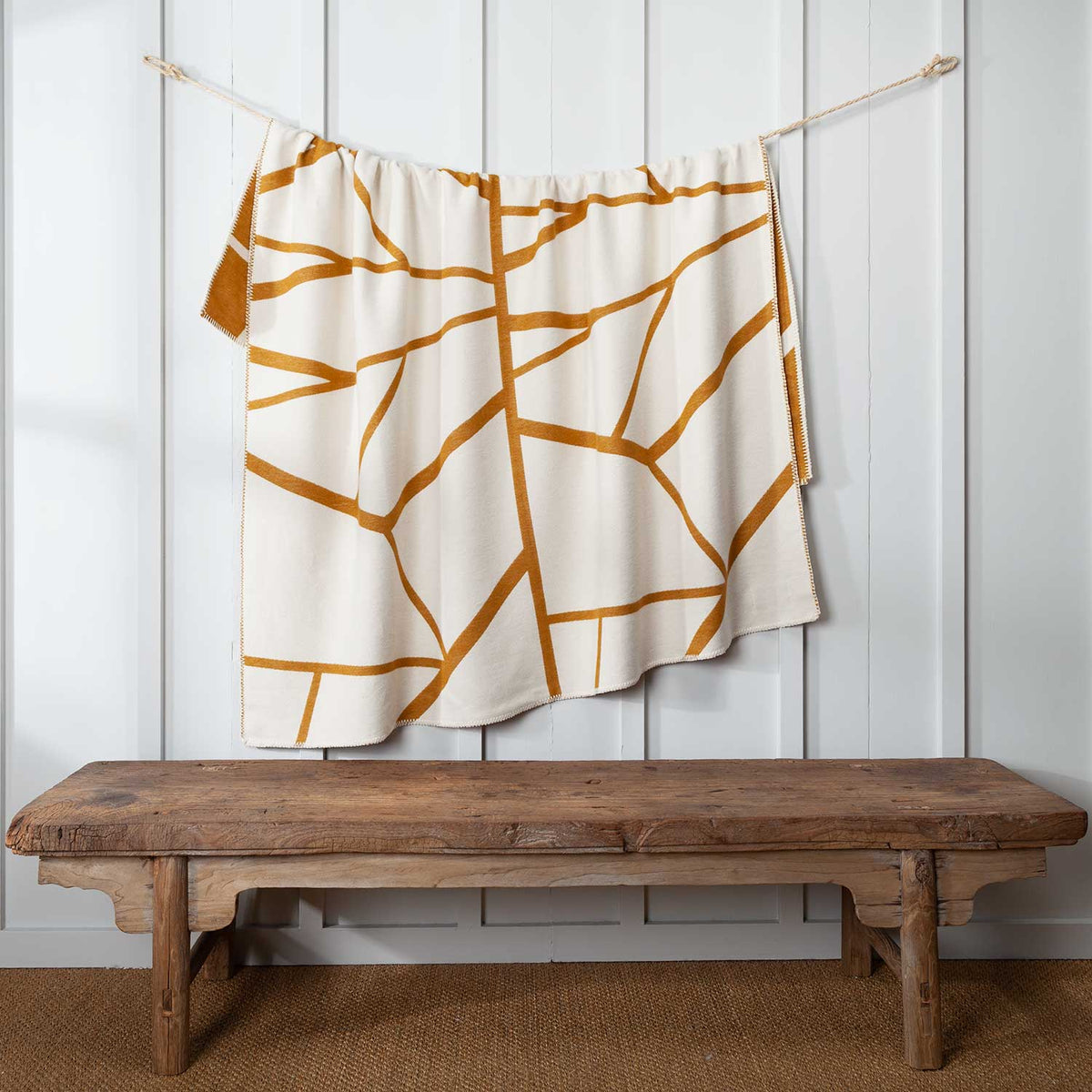 Reverse side white and ochre pattern.