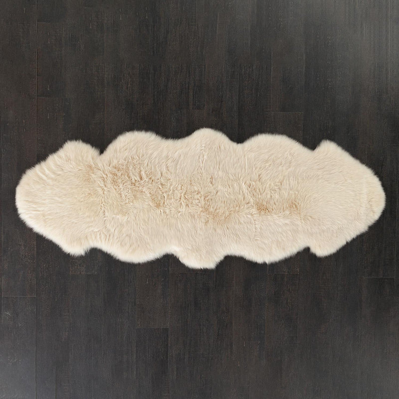 British double Linen colour dyed longwool sheepskin rug soft cream & caramel tones silky-soft fleece From The Wool Company.