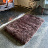 Medium super-soft curly fleece padded sheepskin pet bed non-slip backing chocolate brown tones By The Wool Company