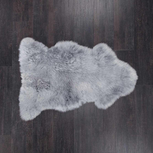 Soft light grey dyed British sheepskin rug. Silky, soft, and thick, really luxurious longwool fleece. From The Wool Company