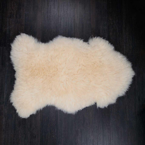 Natural white undyed XL sheepskin thick and luxurious. Fleece length varies between rugs and the seasons. From The Wool Co