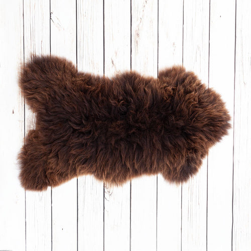  Natural brown undyed sheepskin, with varying tones of brown running through the fleece, soft and dense From The Wool Company