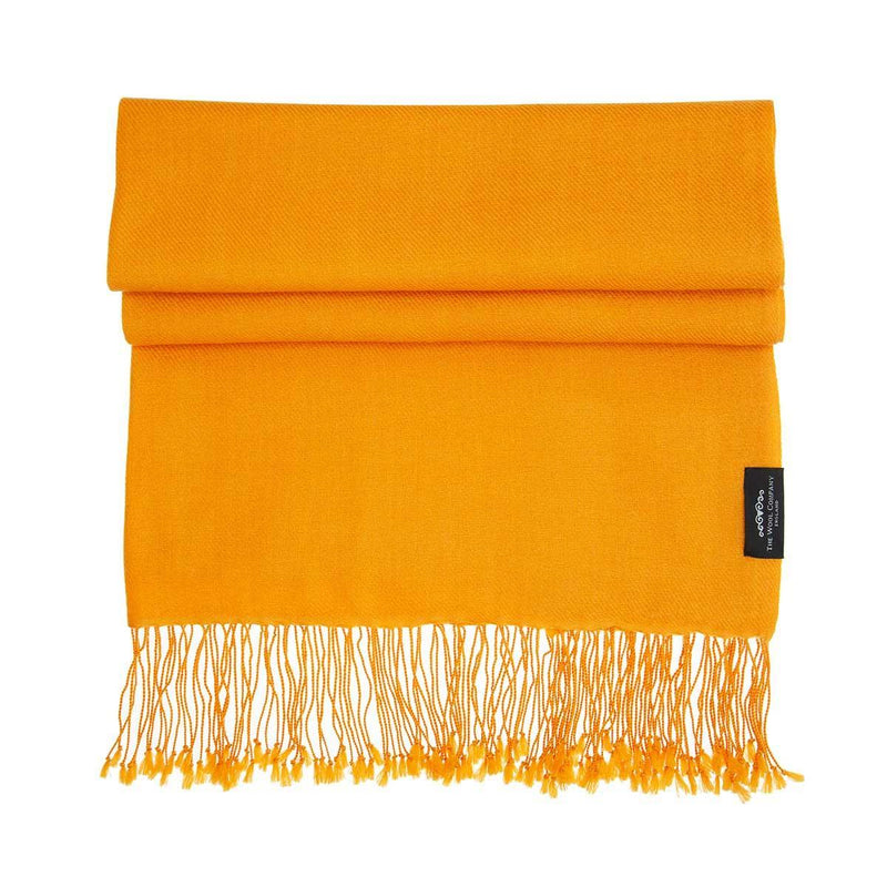 Genuine 100% cashmere pashmina in a warm golden orange tasselled fringe lightweight & warm finest-quality By The Wool Company. Size 200 x 90 CMS.
