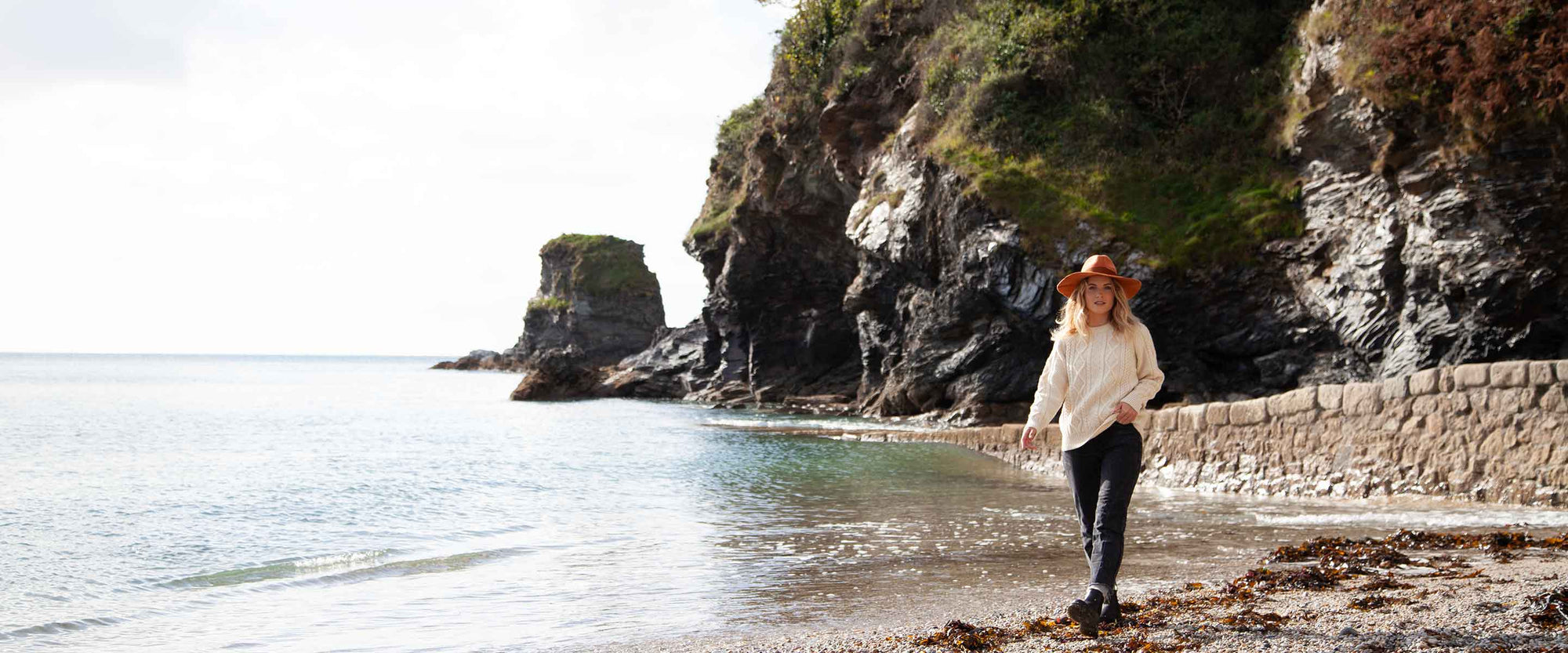  Men's and women's wool knitwear, unisex jumpers, cardigans, and beanies. Each piece is knitted and hand-finished in England.