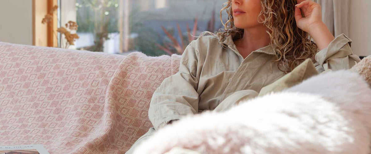 Lambswool and lambswool blend throws traditional and modern, checked, tartan, plain, and patterned in a myriad of colours.