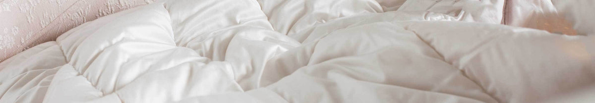 Stunning quality luxury wool duvets with sateen cotton casing and British wool pillows with cotton casing in 3 fill levels