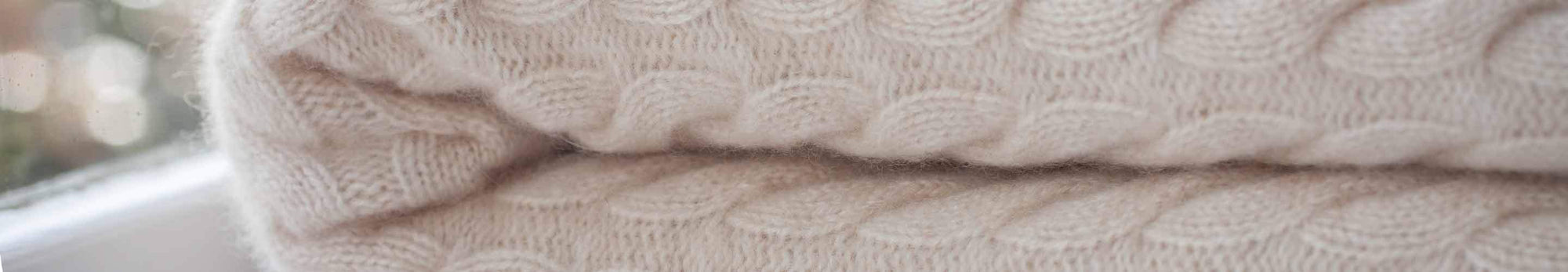 Plain colour sofa and bed throws in a myriad of textures, thicknesses, and fibres, pure new wool, mohair, cashmere, and more