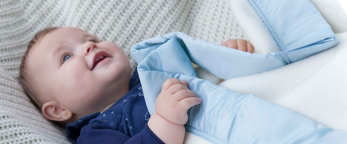 Soft, pure wool baby blankets, traditional and modern. Choose from cellular, satin bound and checked, something for everyone