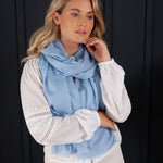 Luxuriously soft merino and silk shawl in light blue twill weave with a soft fine fringe generous size light and airy beautifully warm best-quality By The Wool Company