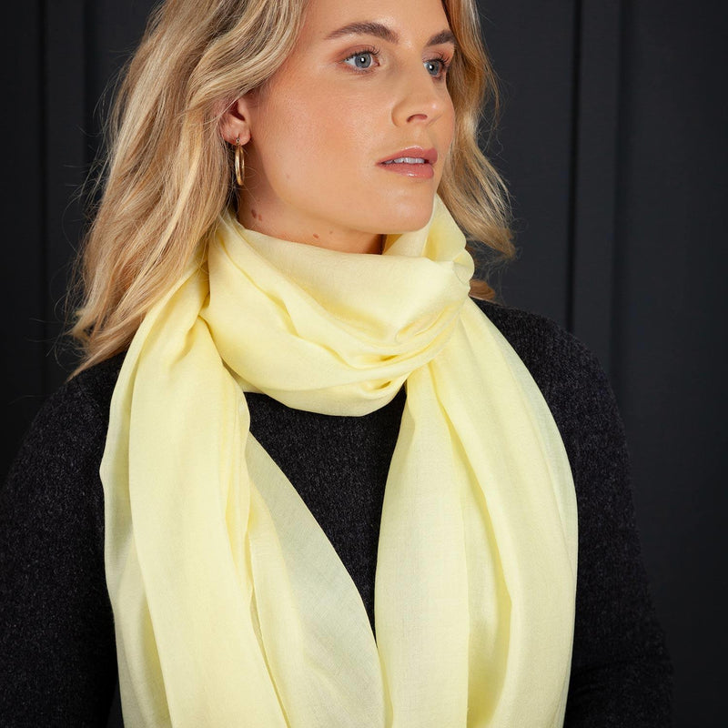Luxuriously soft merino and silk shawl in a light yellow twill weave with a soft fine fringe generous size light and airy  beautifully warm best-quality by The Wool Company