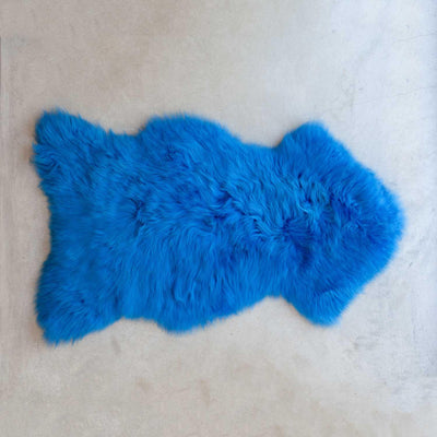 Sheepskin medium, average size is 80 CMS to 100 CMS long X 50 CMS to 63 CMS wide, Soft and tactile in a sky blue colour.