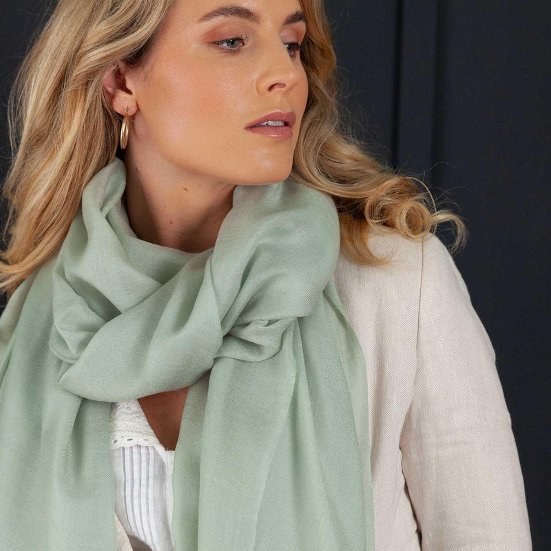 Luxuriously soft merino and silk shawl in sage light green twill weave with a soft fine fringe generous size light and airy beautifully warm best-quality
