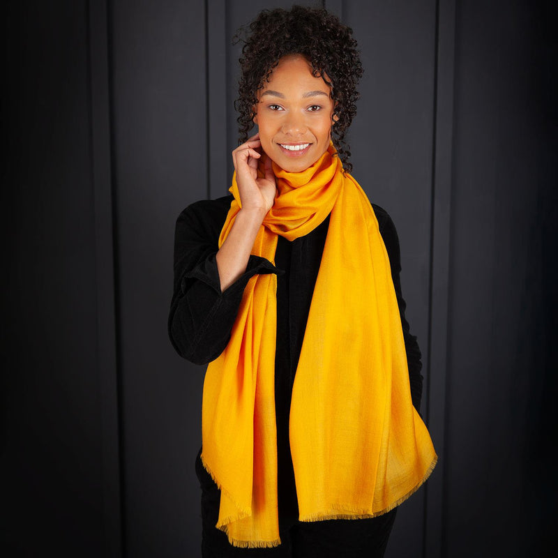 Luxuriously soft merino and silk shawl in mustard twill weave with a soft fine fringe generous size light and airy beautifully warm best-quality