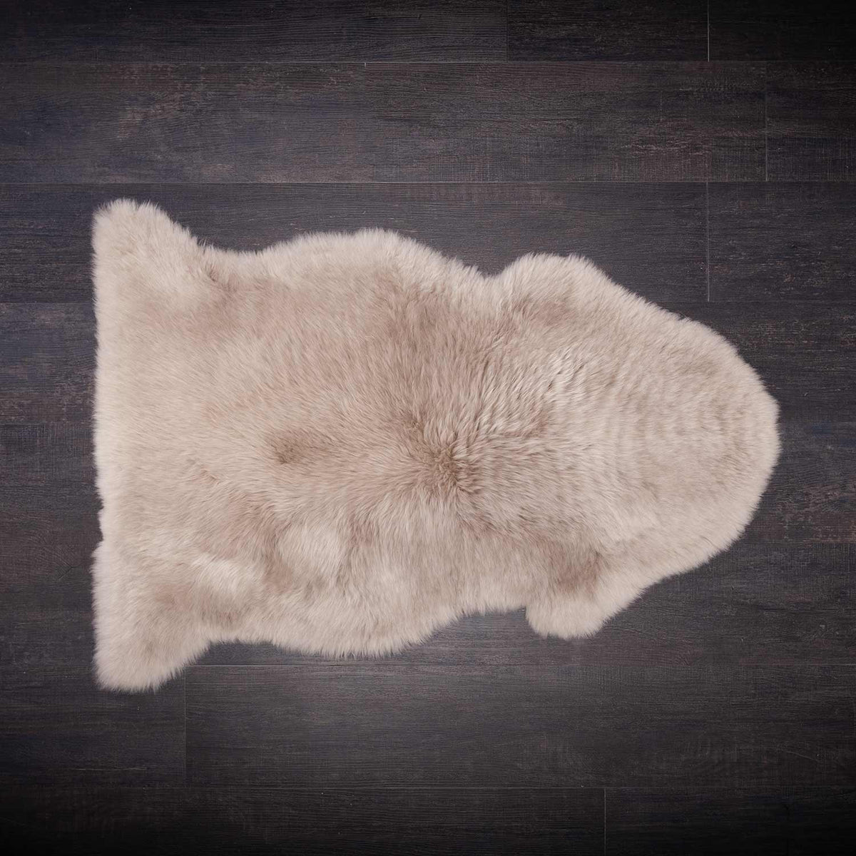 Single sheepskin, very soft and luxurious, with medium length fleece, a silvery fawn tone, size is 95 CMS by 65 CMS, British Sheepskin.