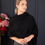 Luxuriously soft merino and silk shawl in a Black twill weave with a soft fine fringe generous size light and airy beautifully warm best-quality by The Wool Company