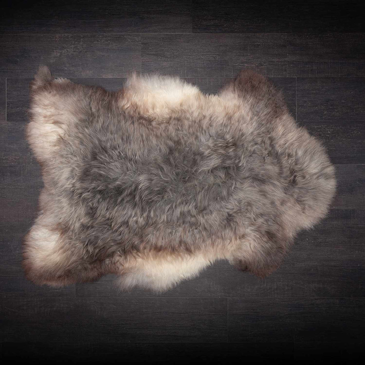 Extra large Swedish sheepskin in rich tones of brown, grey and cream. Approx 100 x 80 CMS.
