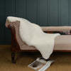 A very large (approximately 115cms long X 79 cms wide Merino wool sheepskin throw for use in he home, great on furniture or floors. By The Wool Company