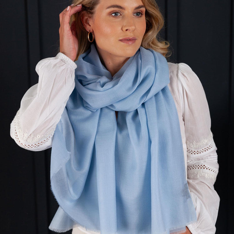 Luxuriously soft merino and silk shawl in light blue twill weave with a soft fine fringe generous size light and airy beautifully warm best-quality