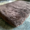 Medium super-soft curly fleece padded sheepskin pet bed non-slip backing chocolate brown tones 83 x 53cm