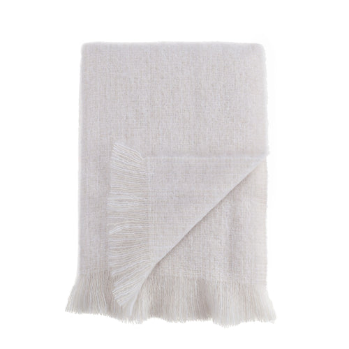 100% Mohair throw lightweight super soft & warm neutral cream & white tones with a soft fringe edge By The Wool Company