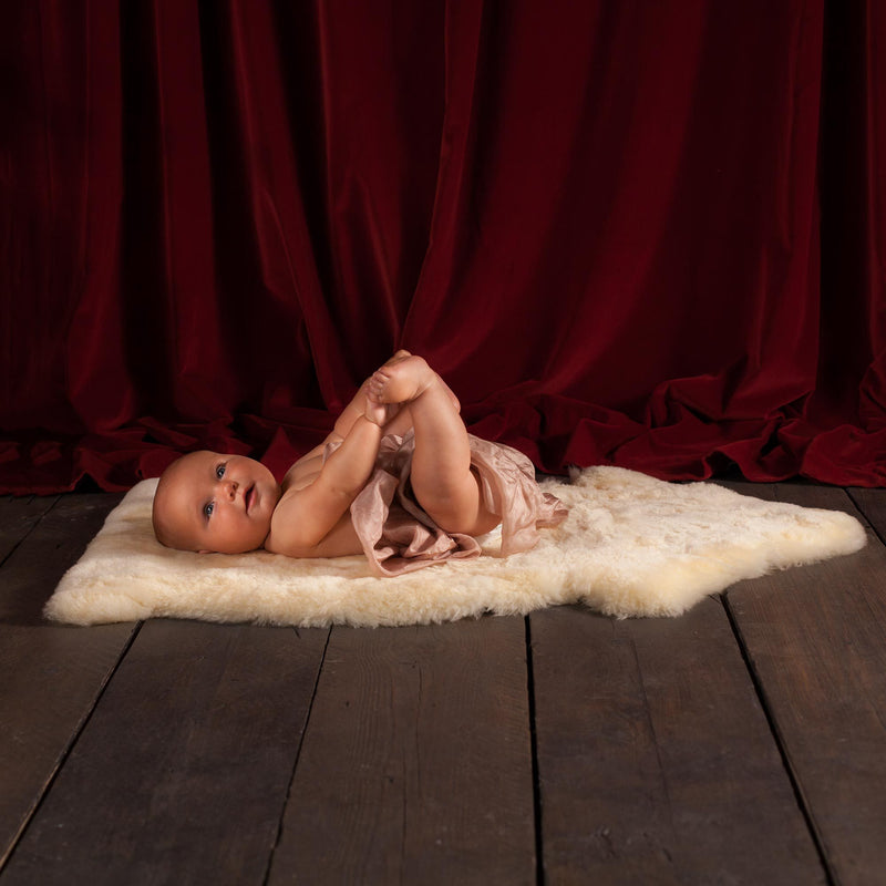 Super soft & luxurious baby lambskin in a soft oaten colour,  shorn down to 35mm for extra support. Top-quality sheepskin