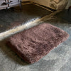 Small super-soft curly fleece padded sheepskin pet bed non-slip backing chocolate brown tones By The Wool Company