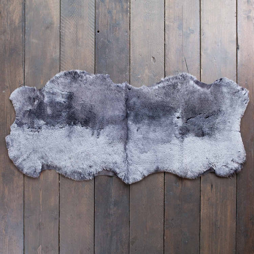 Double size sheepskin in shades of grey, silver, & charcoal. Extremely soft and beautifully finished. From The Wool Company