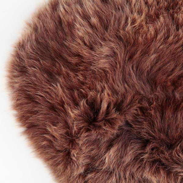 British double sheepskin in natural chocolate brown Silky soft made from two skins sewn together Luxurious & thick fleece