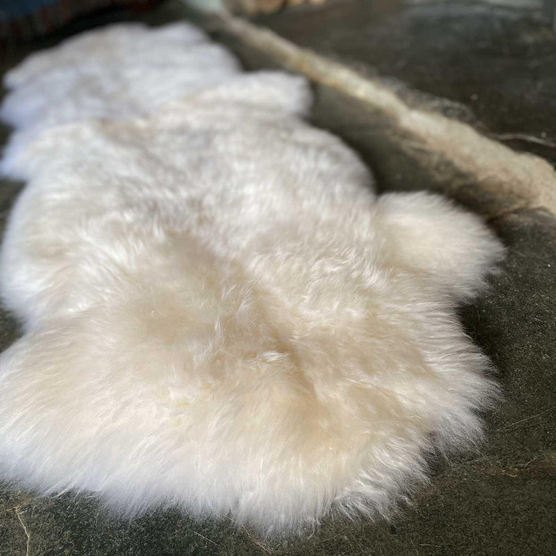 British double sheepskin in natural white Silky soft made from two skins sewn together Luxurious & thick Eco Tanned in the UK