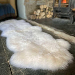 British double sheepskin in natural white Silky soft made from two skins sewn together. Luxurious & thick By The Wool Company