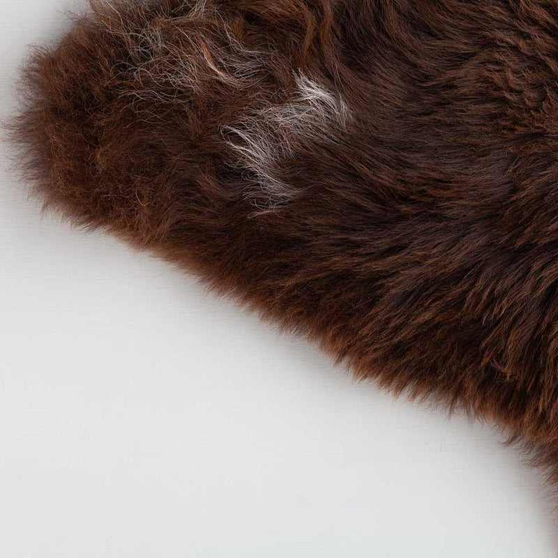Genuine British undyed natural chocolate brown sheepskin generous sizing with thick, sumptuously soft longwool fleece,