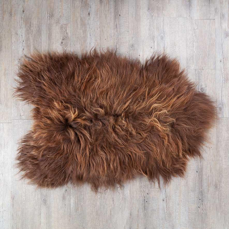 Undyed Icelandic sheepskin, chocolate brown with blonde highlights flecked across the fleece. Silky soft By The Wool Company