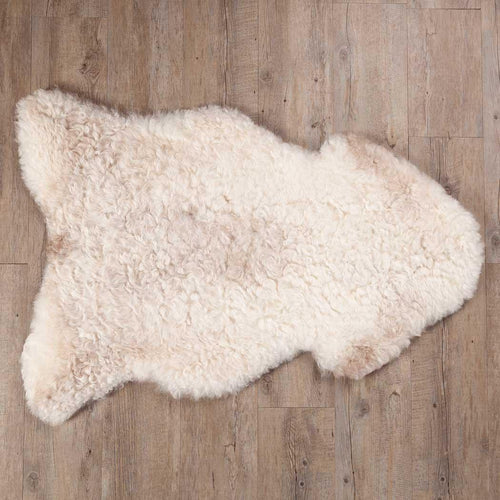 Undyed, shorn XL Icelandic sheepskin, greys, and browns flecked through a natural white soft fleece, From The Wool Company