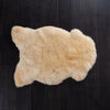 Seconds natural undyed eco-tanned  sheepskin thick and luxurious. Fleece length varies between rugs and the seasons. From The Wool Co