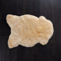 Seconds natural undyed eco-tanned  sheepskin thick and luxurious. Fleece length varies between rugs and the seasons. From The Wool Co