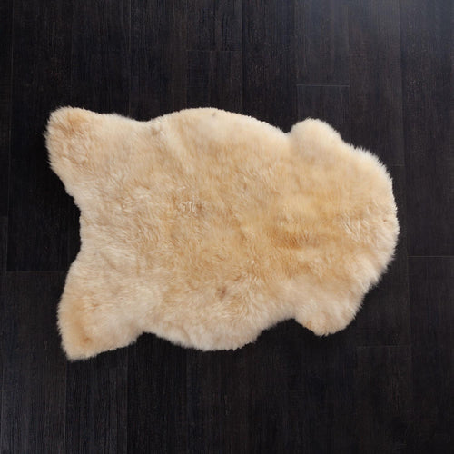 Seconds natural undyed sheepskin thick and luxurious. Fleece length varies between rugs and the seasons. From The Wool Co