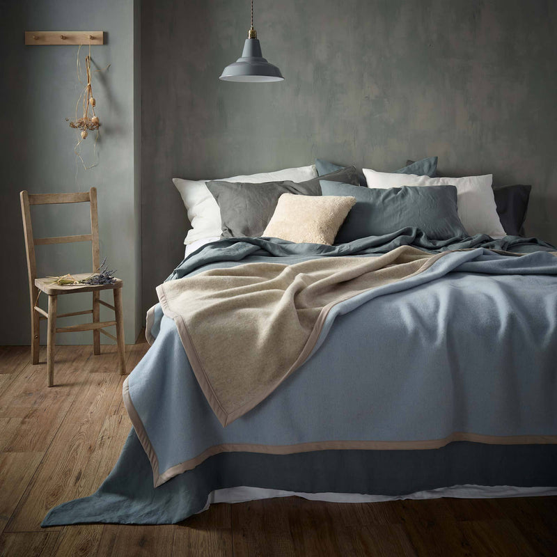 Incredibly light, springy, and soft, double-faced blankets.430 gsm100% pure new wool with fabric binding  By The Wool Company