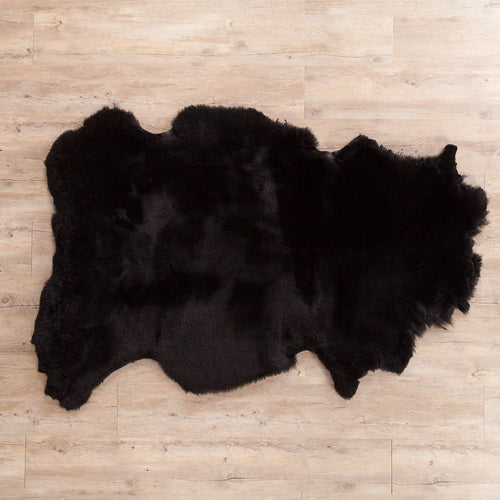 Soft, luxurious sheepskin throw in black tones would look fabulous in any interior shorn fleece dense and supportive