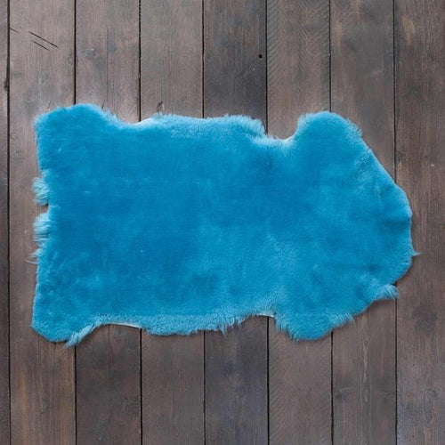 Soft, luxurious sheepskin throw in bright turquoise blue would look fabulous in any interior shorn fleece, dense & supportive