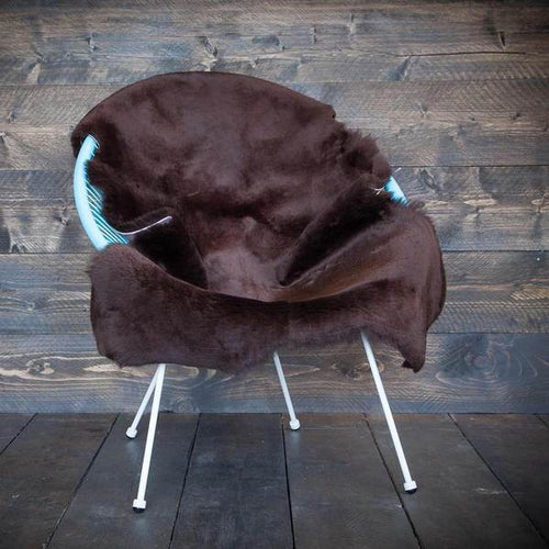 Soft, luxurious sheepskin throw in rich chocolate brown would look fabulous in any interior shorn fleece By The Wool Company