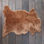 Soft, luxurious sheepskin throw in warm light brown tones would look fab in any interior shorn fleece dense & supportive