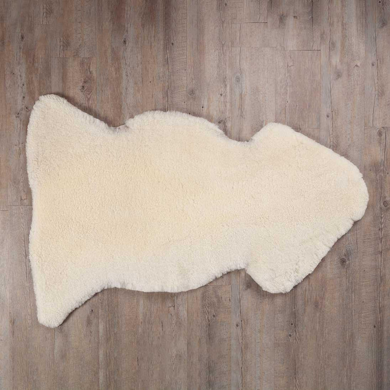 Extra-large sheepskin throw in natural creamy tones would look fab in any interior, shorn, undyed fleece, soft and supportive