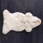 Flecks of coffee brown running through a light-coloured creamy fleece. Soft and silky British hide From The Wool Company