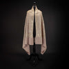 Hand-crafted 100% cashmere pashmina heavily embroidered with gold thread on a neutral background From The Wool Company
