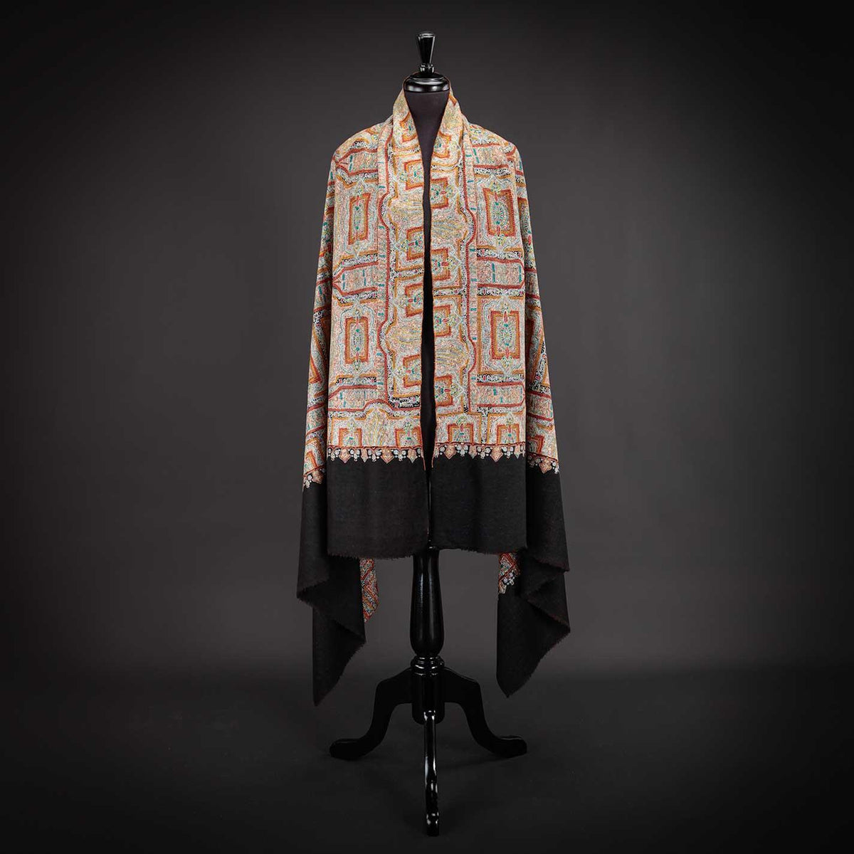 The embroidery for this stunning shawl took almost a year for an accomplished 'golden hands' craftsman to complete in the Ganderbal district of Kashmir, where hand embroidery is an age-old tradition. Once the embroidery is finished, the shawl is carefully checked and washed in crisp Himalayan water.