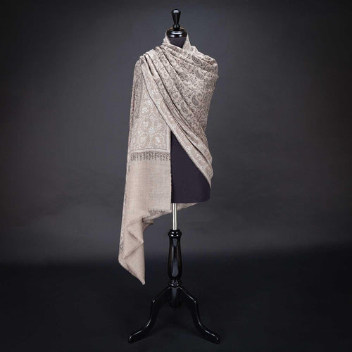 Hand-crafted 100% baby cashmere pashmina embroidered with black & white thread on a neutral background From The Wool Company