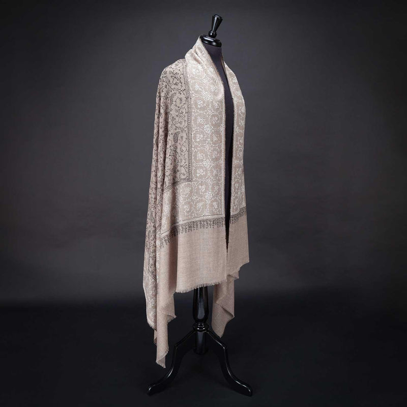 Hand-crafted 100% baby cashmere pashmina embroidered with black & white thread on a neutral background finest-quality