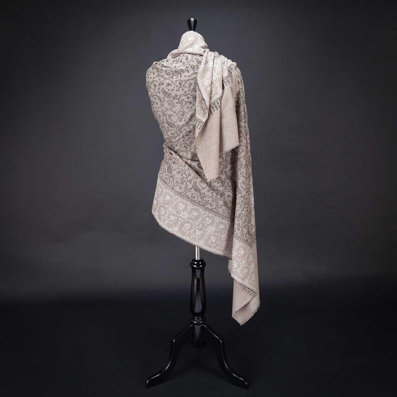 Hand-crafted 100% baby cashmere pashmina embroidered with black & white thread on a neutral background finest-quality